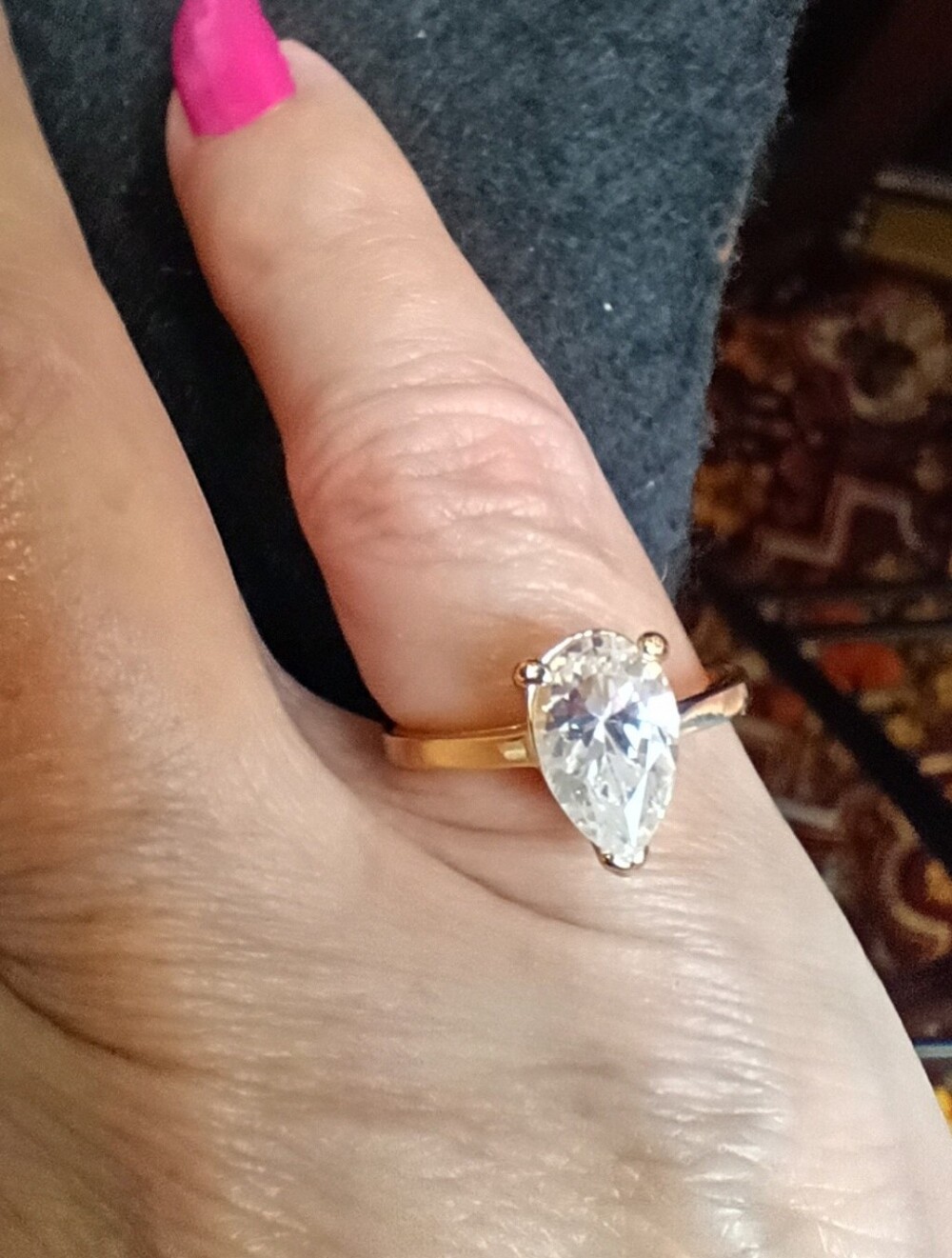 Gold Finish Pear-Cut Solitaire Ring with Clear Cubic Zirconia Stone - Women